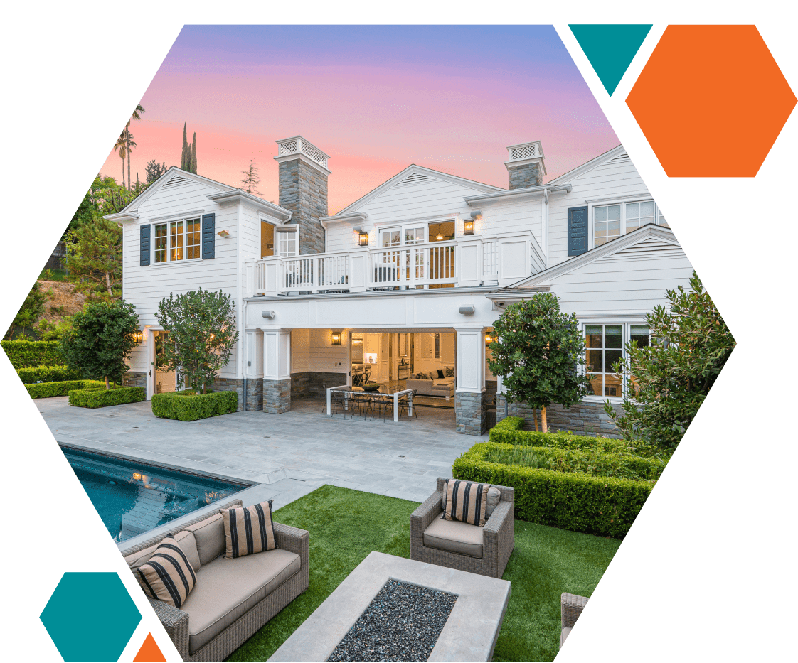 Modern house with pool at sunset.