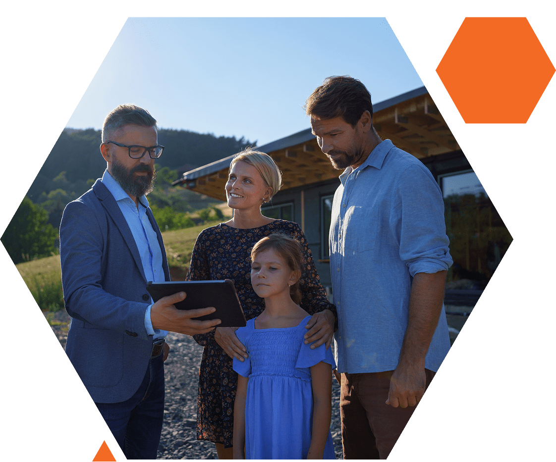 Family with tablet outside modern building.